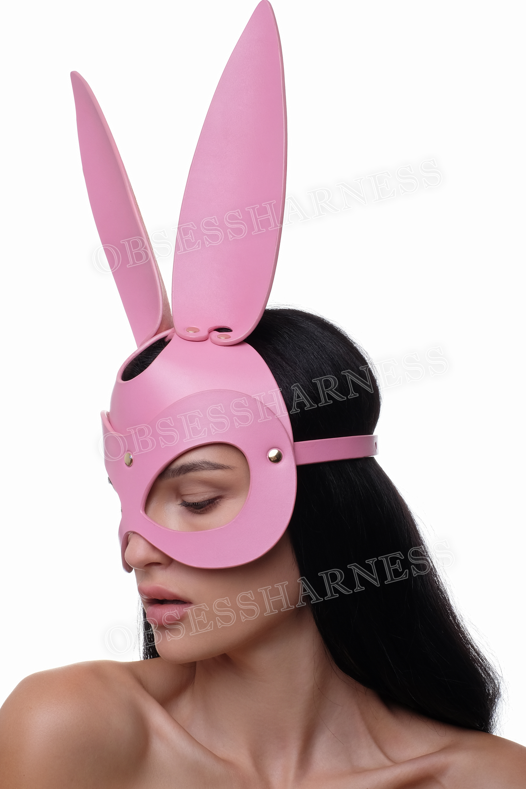 bunny mask pink  leather for half the face with cutouts for the eyes and a clasp at the back for kink parties
