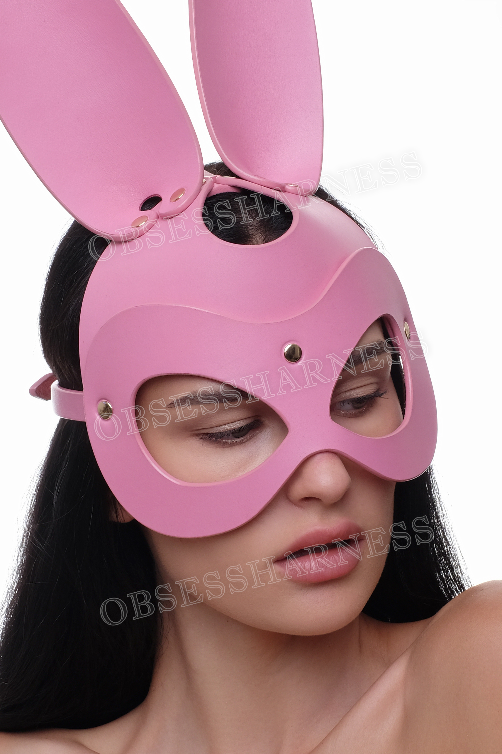 Leather cosplay bunny mask pink close-up for half the face with cutouts for the eyes and a clasp at the back for a kink party